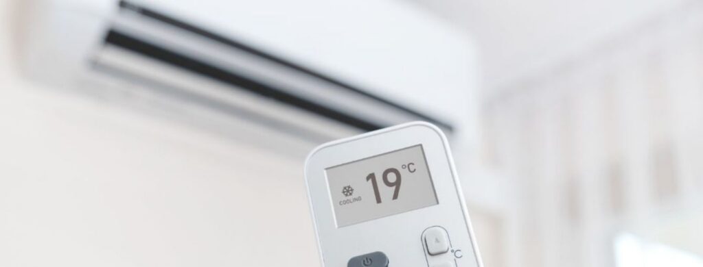 An air conditioning unit with a remote thermostat.